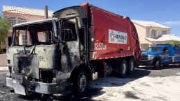 The charred remains of a Republic Services truck after a fire on April 21, 2017. (Adam Herbets/FOX5)